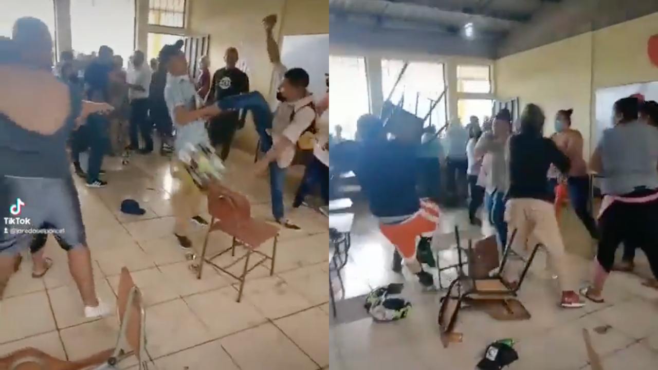 Padres de familia se pelean a sillazos durante junta escolar